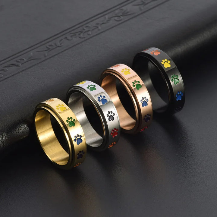 Rotatable Anti-Stress Ring with Paw Prints – Stainless Steel Ring with Rainbow Colors